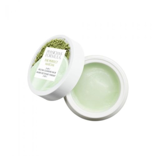 En rund behållare med grönt pulver på locket och kräm inuti, märkt "Herbal Formula" och "Matcha".