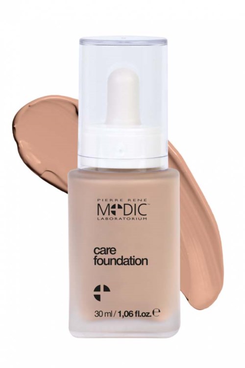 Pieni meikkivoidepullo ja sen vieressä beige meikkivoide.