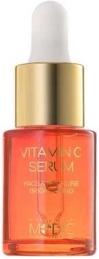 Kleine orange Flasche mit weißem Deckel und Goldrand, gekennzeichnet als Vitamin C Serum für Gesichtspflege.