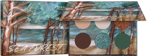 A makeup palette with four eyeshadow colors and art of a sea forest on packaging.