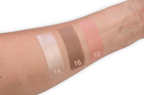 Swatch of different foundation shades on a person's arm, numbered 14, 16, and 10 from left to right.