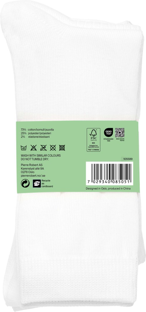 A white fabric item with a green label showing care symbols and barcode.