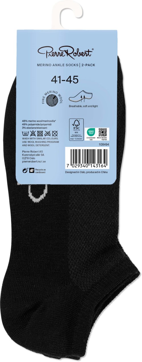 Black socks with a blue label, size 41-45, with a logo and barcode on the packaging.
