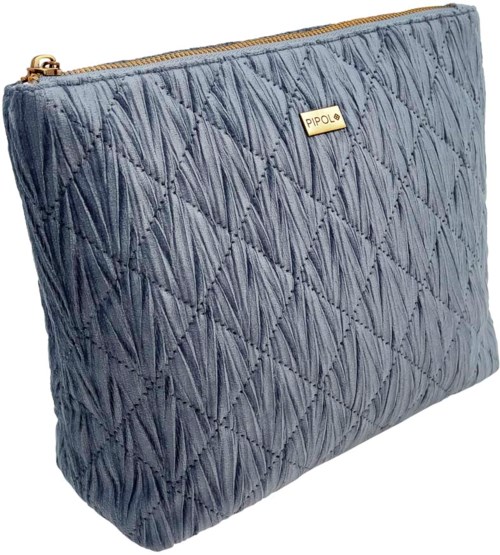 A blue quilted fabric pouch with a gold zipper and a Pipilo label on the front.