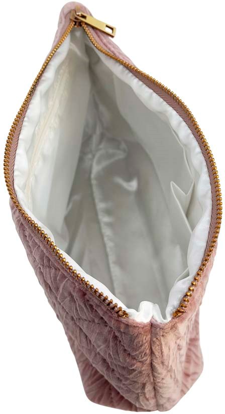 Pink quilted bag with a gold zipper and white interior lining.