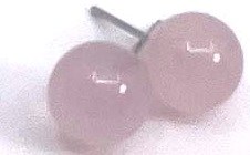 Two pink cherries with green stems on a white background.
