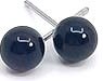 Two dark blue round objects with a small white circle and a white dot inside, possibly buttons or knobs.