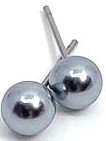 Two shiny silver balls connected by a small rod, like a simple weight or jewelry piece.