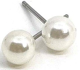 Two shiny silver balls on a stand with a long, thin stick. They look like jewelry or decorative items.