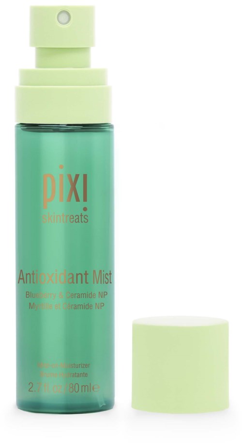 A green spray bottle labeled Pixi Antioxidant Mist with blueberries and jojoba, and a separate green cap.