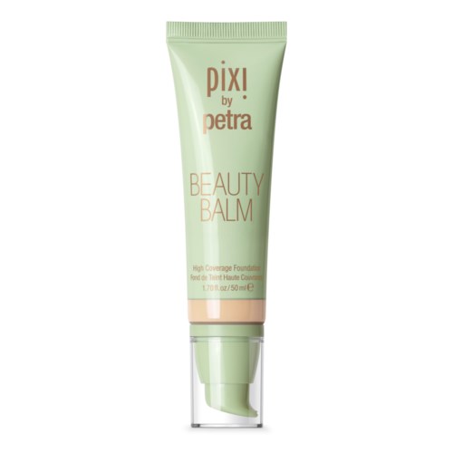 Eine grüne Tube mit der Aufschrift 'Pixi by Petra Beauty Balm' und einer transparenten Pumpe, enthält Make-up- oder Hautpflegeprodukt.