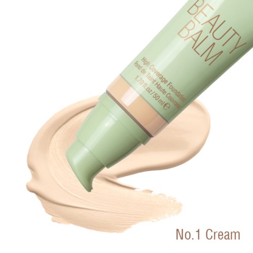Ein pastellgrüner Tuben mit beigem Deckel, die beige Creme auf weißem Hintergrund verstreut. Produktdetails auf Etikett.