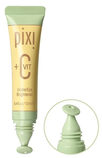 En tube med øyebrightener med en rulleball, merket Pixi, inneholdende vitamin C, designet for huden under øynene.