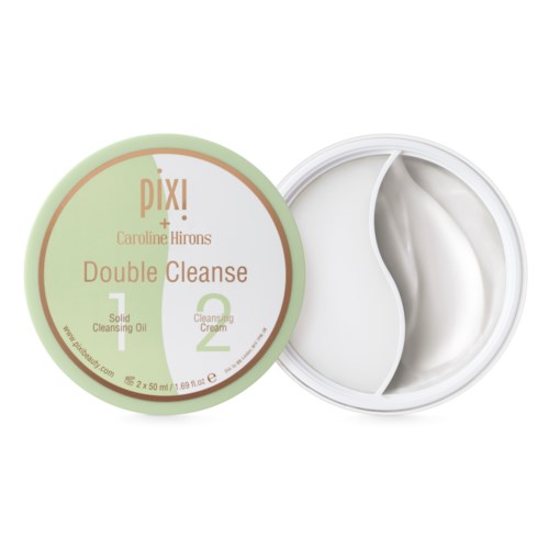En hudvårdsprodukt med rund lock märkt 'Pixi' och delad kräm inuti märkta 'Cleanse 1' och 'Cleanse 2.'
