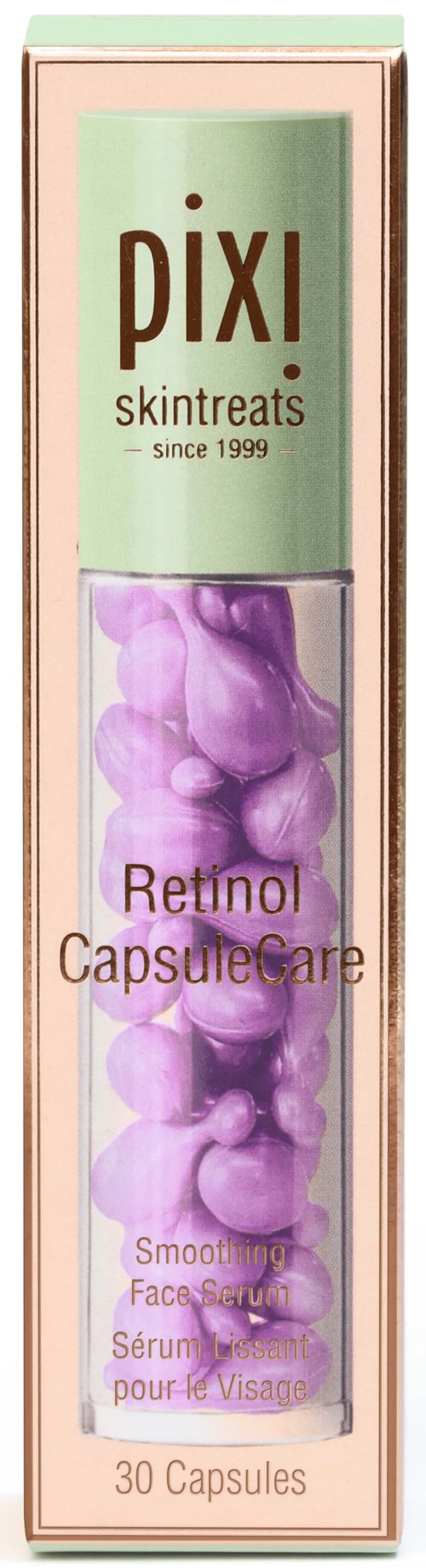 A box containing pink capsules labeled 'Retinol Capsule Care' for face skincare. The brand is Pixi, established in 1999.