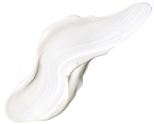 A thick, white cream spread with brush strokes on black background.