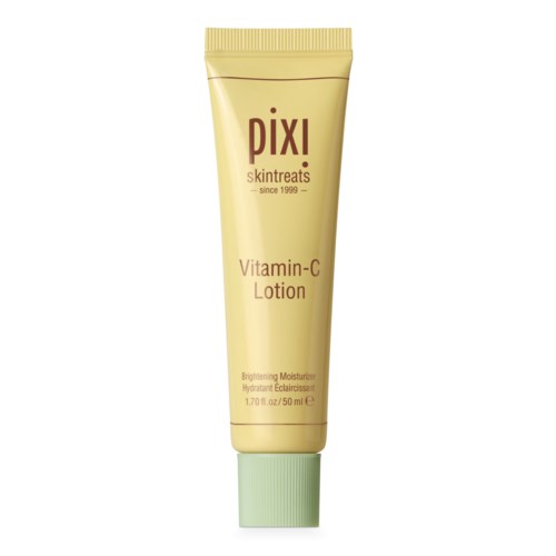 A tube of Pixi Vitamin-C Lotion with a beige cap and yellow-green packaging, labeled for brightening skin.