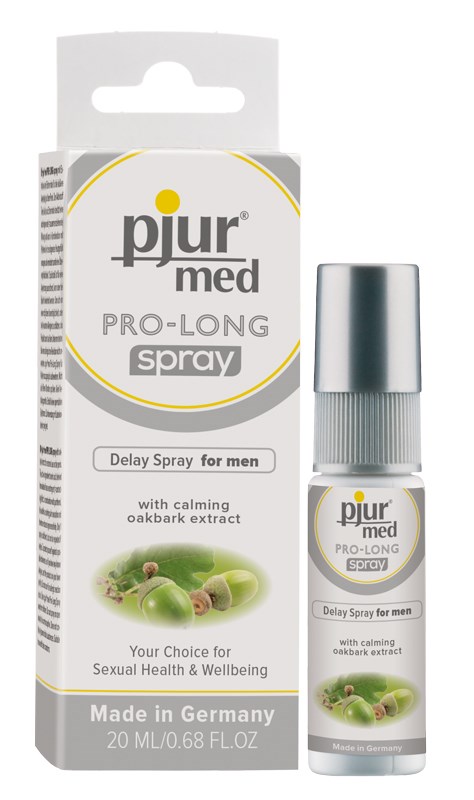 A small spray bottle labeled Pjur Med Pro-Long with calming oakbark extract, designed for men's use, in front of its box.