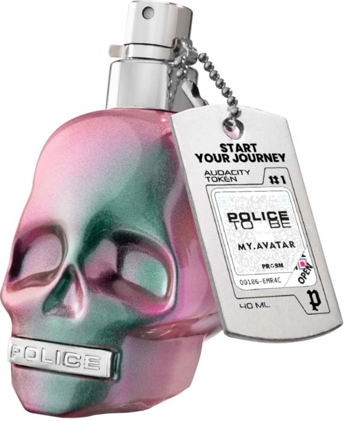 En parfume flaske i form af en pink og grønkranium med tag og kæde.