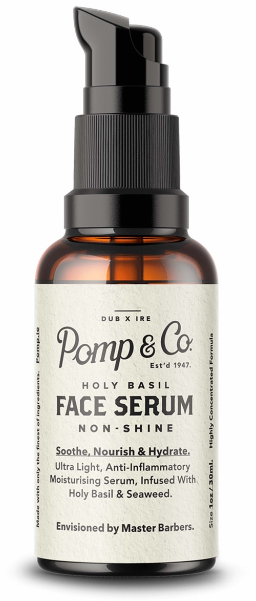 A small brown bottle with a black pump, labeled 'Pomp & Co. Face Serum with basil, seaweed, and other ingredients.'