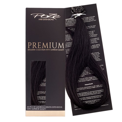 Black hair extension set with a brand label and product information on packaging. The set includes 20 pieces of hair.