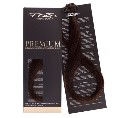A black package labeled 'PREMIUM' contains hair extensions, with a sample hair piece attached to the inside.