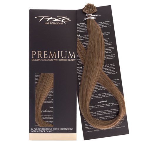 A set of 20 luxury keratin hair extensions, light brown, attached to black and golden packaging.