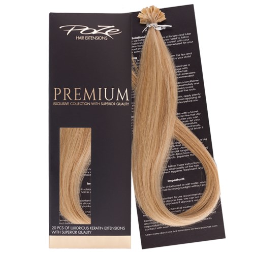 A blonde hair extension attached to black packaging with the text "Premium" and a small hair sample.