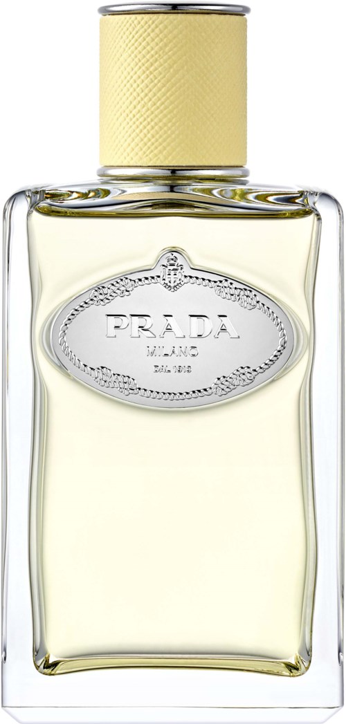 En klar glasparfylåda med gul kork och Prada-logga på framsidan.