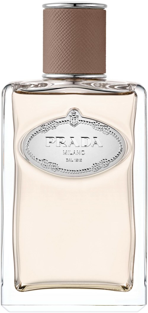 A clear perfume bottle with a brown cap and a Prada label, containing light-colored perfume.