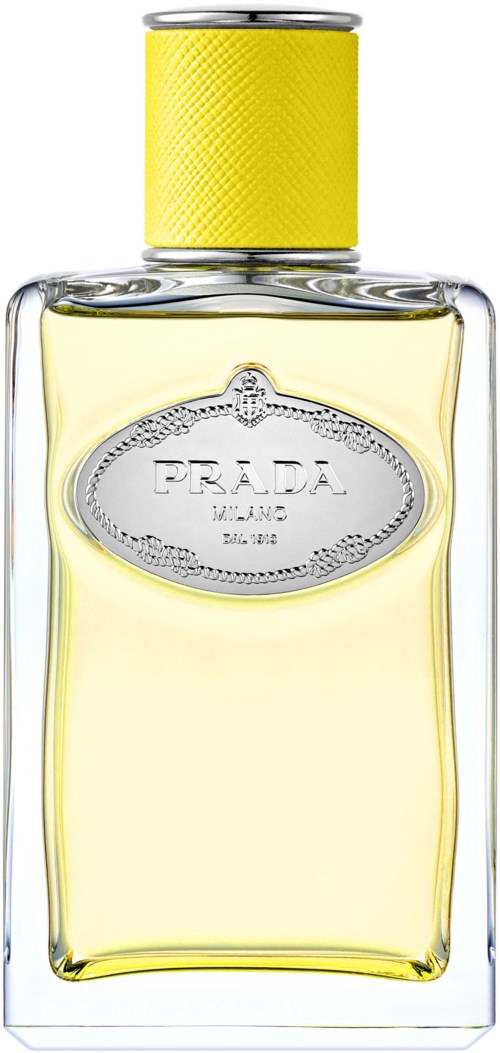 A bottle of Prada perfume with a yellow cap and a rectangular shape. The label is silver and oval-shaped.