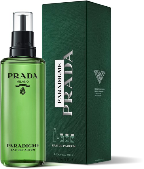 En grøn Prada parfymesprayflaske ved siden af en matchende æske med hvid og sort tekst.