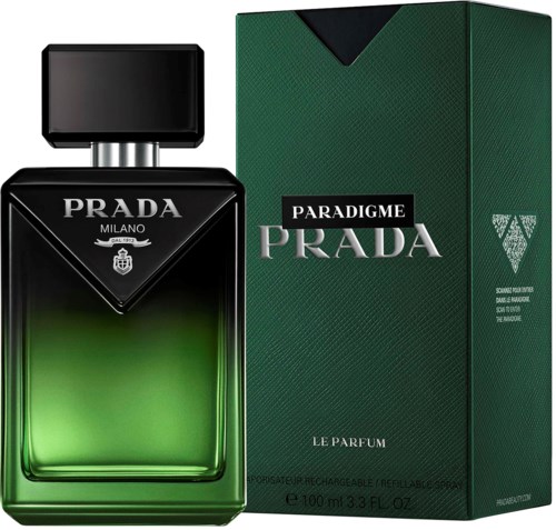 Butelka perfum Prada Milano Paradigme obok zielonego opakowania.