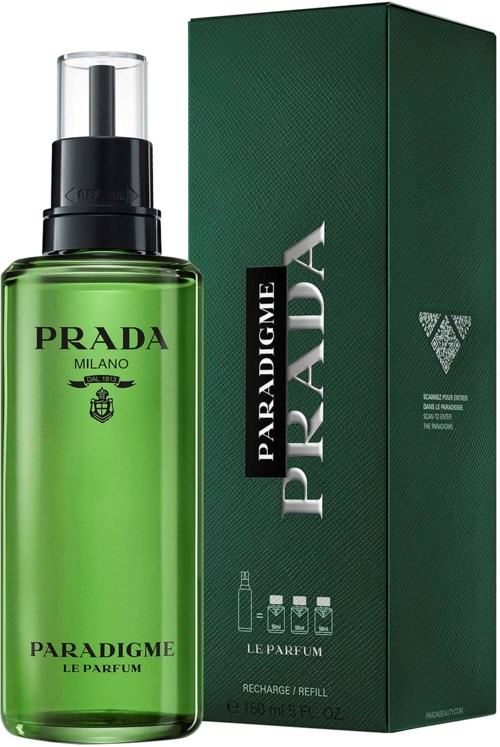 Zielona butelka perfum Prada Paradigme z rozpylaczem obok zielonego pudełka.
