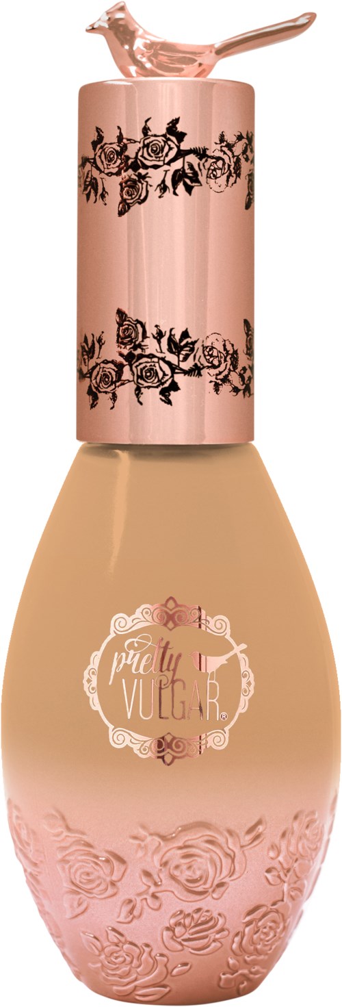 Een fles met een roze bloemendessin bovenop, een crèmekleurig middenstuk en geperste rozen onderaan.
