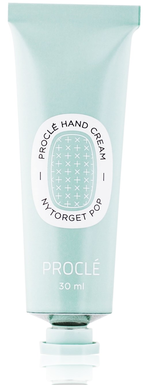 En ljusblå tub med handkräm, vit etikett och svart text, står 'Proclé Hand Cream' och '30 ml'.