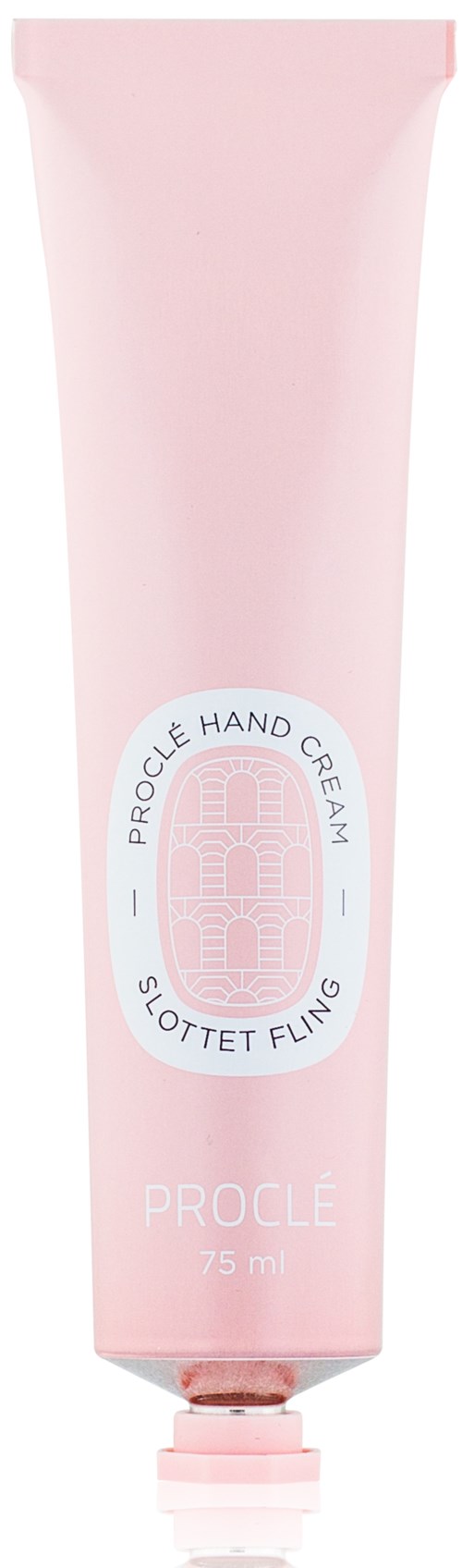 En rosa tube med håndkrem med hvit etikett, som viser merke og volum på 75 ml.