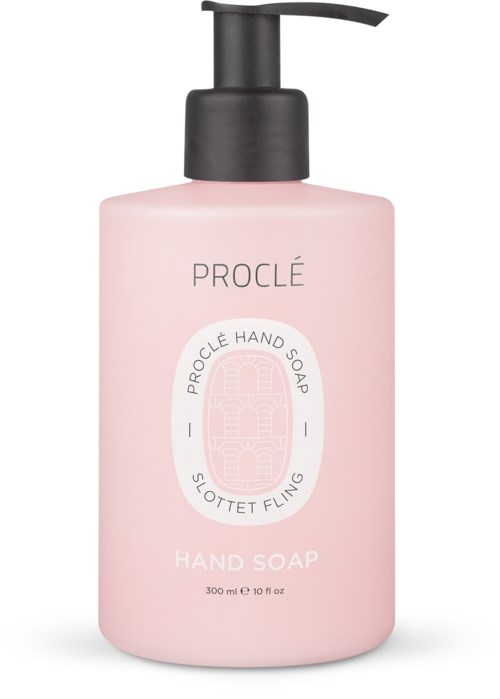 En rosa handtvålflaska med svart pump, märkt Proclé Hand Soap, 300 ml, enkel design.