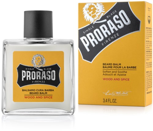 Balsam do brody w przejrzystej butelce z żółtą etykietą, czarnym korkiem i pudełkiem z logo lwa, nazwą produktu i opisem.