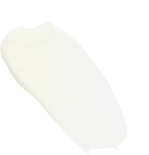 En hvit klatt med krem eller lotion på en hvit overflate, med glatt, kremet tekstur.