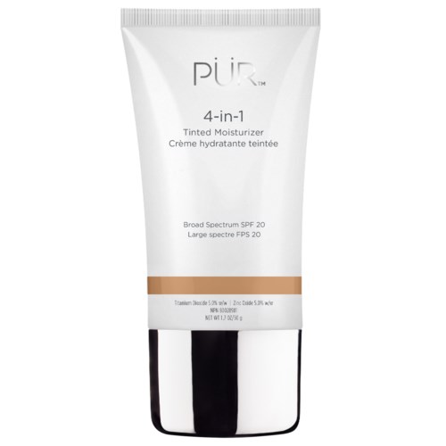 Eine weiße Tube mit getöntem Feuchtigkeitscreme mit SPF 20, gekennzeichnet 'PUR 4-in-1', mit braunem Streifen am unteren Ende.