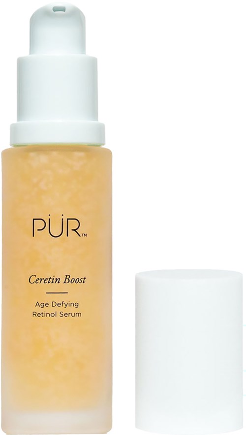 En gul serumflaska med vit pump och lock, märkt PÜR Ceretin Boost, Age Defying Retinol Serum.