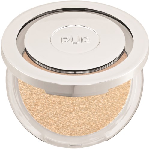 En rund puderpåse med spegel och beige puder inuti, använd för smink.

