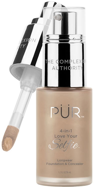En beige flaske med foundation med en gennemsigtig pumpe og applikatorstav.