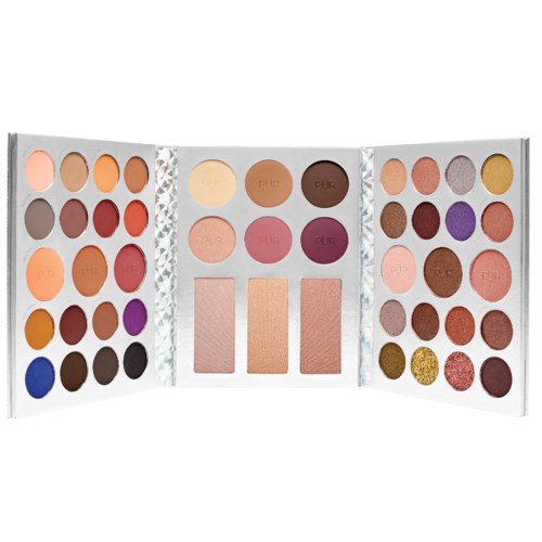 The makeup palette has many eyeshadows in different colors and three large blush or highlighter pans.