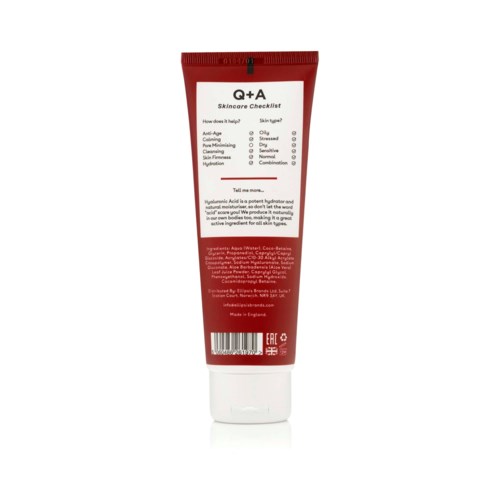 A red and white skincare product tube with a checklist for skin type and issues.