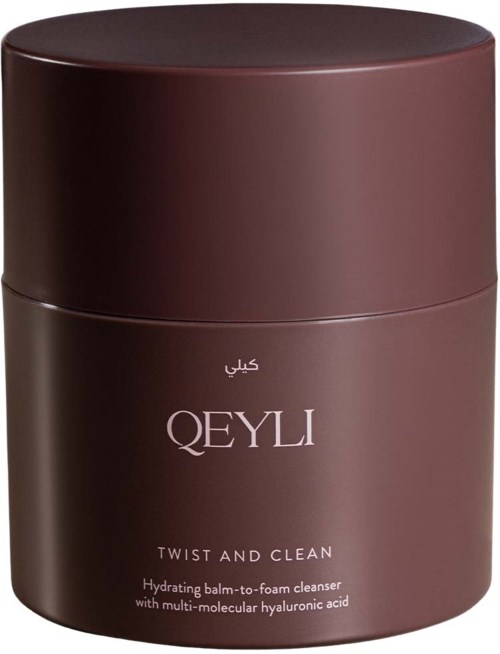 Qeyli twist and clean återfuktande balm till skum rengöring i en mörkbrun burk med matchande lock.
