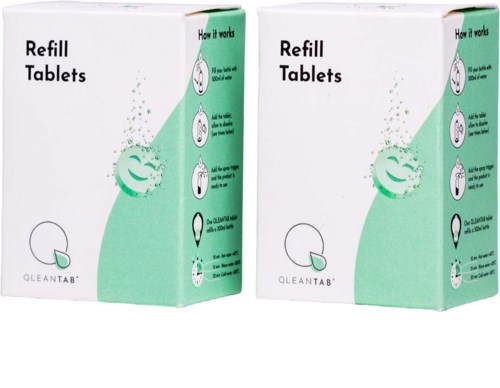 Twee dozen navultabletten met instructies en een logo onderaan.