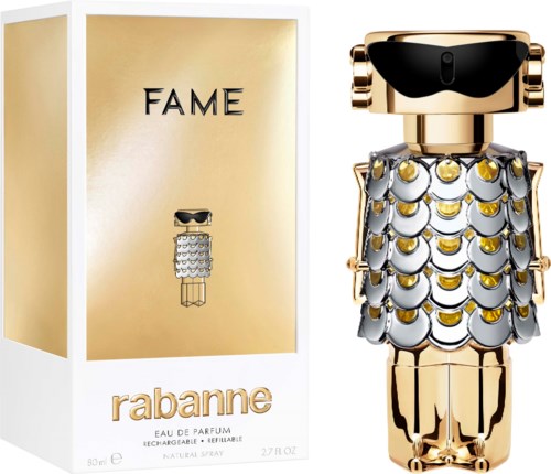 Een parfumfles in de vorm van een robot met een gouden en zilveren lichaam, naast een gouden doos met 'FAME' en 'Rihanna'.