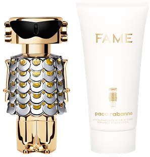 En parfyllflaska formad som en robot med metall- och guldfärger bredvid en vit tub märkt 'FAME' och 'Pacorabanne.'